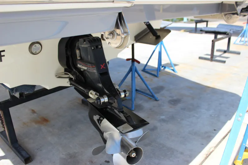 Slide: The Image of 2019 Sea Ray SDX 290 boat with MerCruiser outdrive on a stand. - 4
