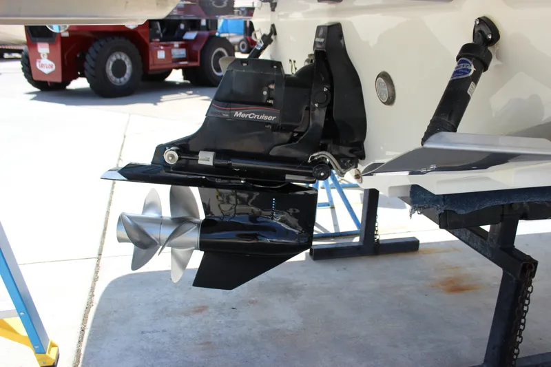 Slide: The Image of Close-up of a 2019 Sea Ray SDX 290 boat's MerCruiser engine and propeller. - 28