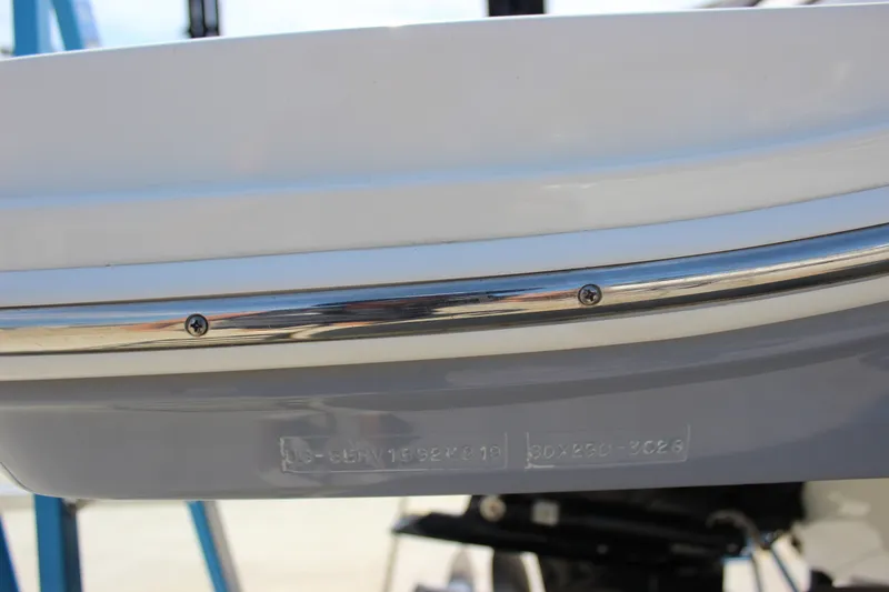 Slide: The Image of Close-up of 2019 Sea Ray SDX 290 boat hull with identification number. - 29