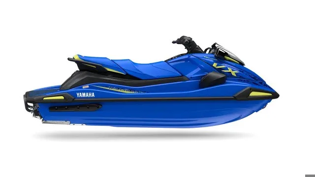 Slide: The Image of A blue 2027 Yamaha WaveRunner VX Deluxe with a sporty design and yellow accents. - 2