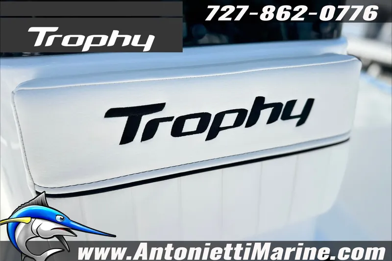 Slide: The Image of 2027 Bayliner Trophy T18 boat branding with contact details and website. - 12