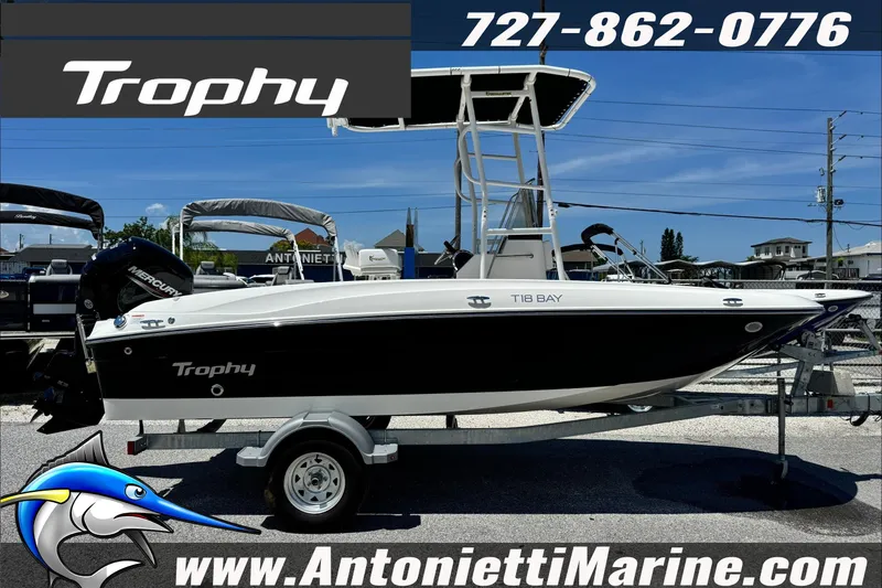 Slide: The Image of 2027 Bayliner Trophy T18 boat displayed at Antonietti Marine dealership. - 4
