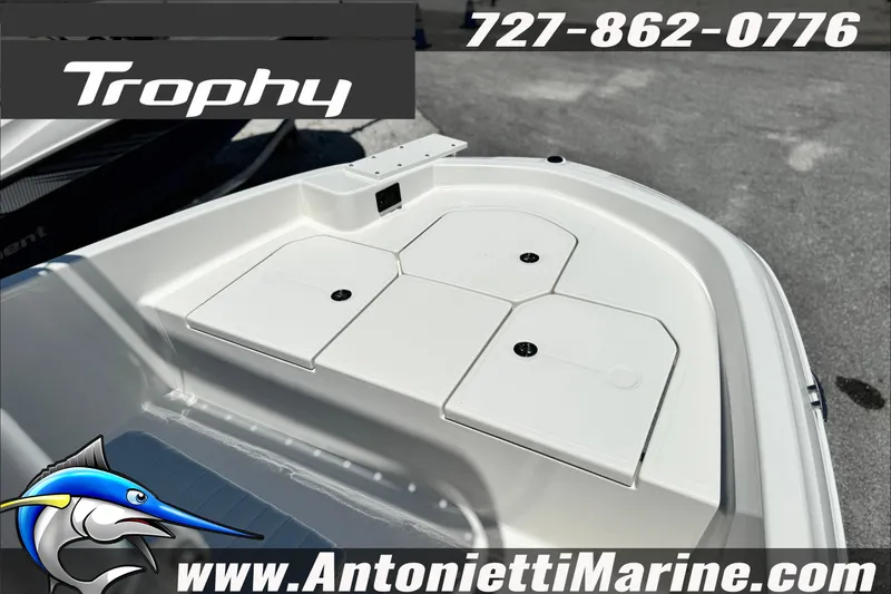 Slide: The Image of 2027 Bayliner Trophy T18 boat deck with storage compartments, Antonietti Marine branding. - 9