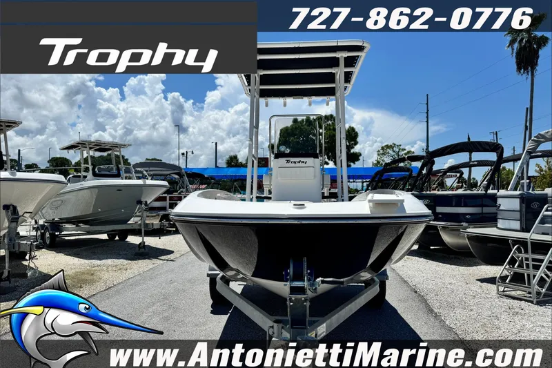 Slide: The Image of 2027 Bayliner Trophy T18 boat on display at Antonietti Marine dealership. - 2