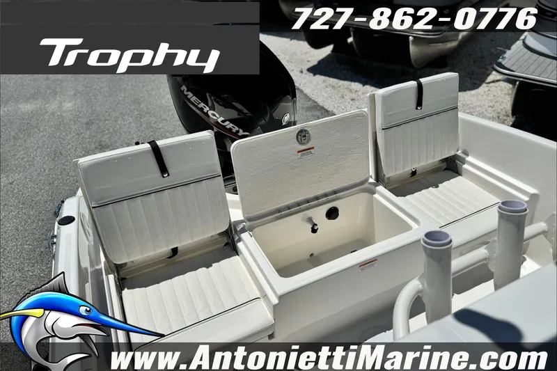 Slide: The Image of 2027 Bayliner Trophy T18 boat interior with storage compartments and seating. - 14
