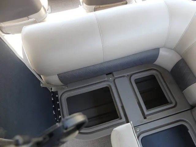 Slide: The Image of The image shows a cushioned seating area with storage compartments underneath. - 29