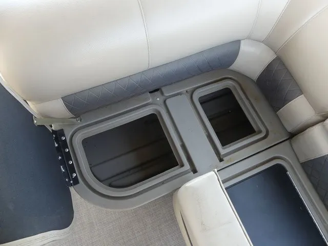 Slide: The Image of A seating area with lifted cushions reveals storage compartments underneath. - 30