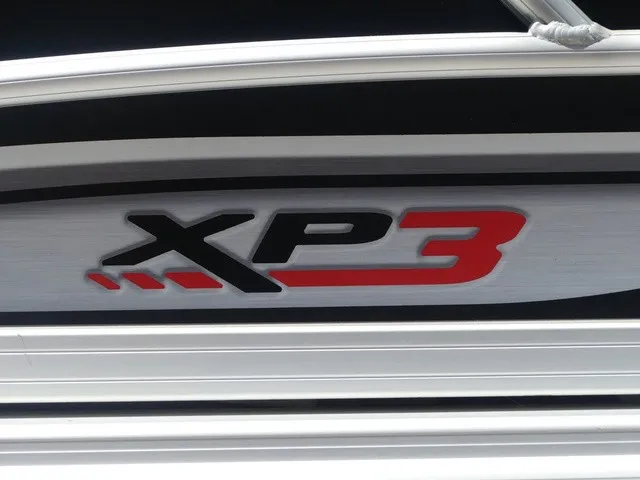 Slide: The Image of Close-up of the "XP3" logo on a 2020 Sun Tracker SportFish 22 DLX. - 41