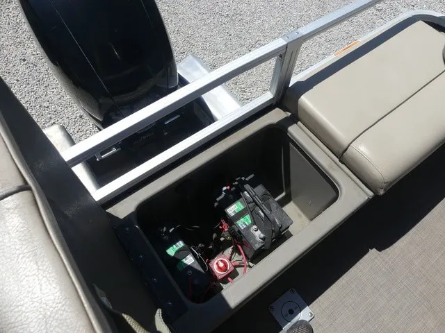 Slide: The Image of Battery compartment of a 2020 Sun Tracker SportFish 22 DLX with two batteries. - 27