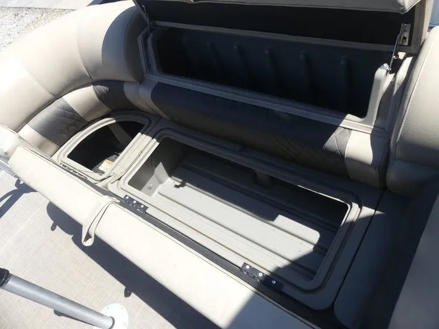 Slide: The Image of Bench seat with open storage compartment on a Sun Tracker SportFish 22 DLX boat. - 36