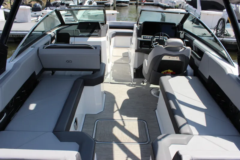Slide: The Image of 2024 Cobalt R6 Outboard boat interior with spacious seating and modern design. - 12