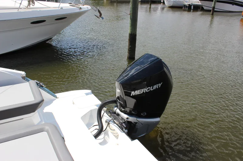 Slide: The Image of 2024 Cobalt R6 Outboard with Mercury engine docked in marina. - 48