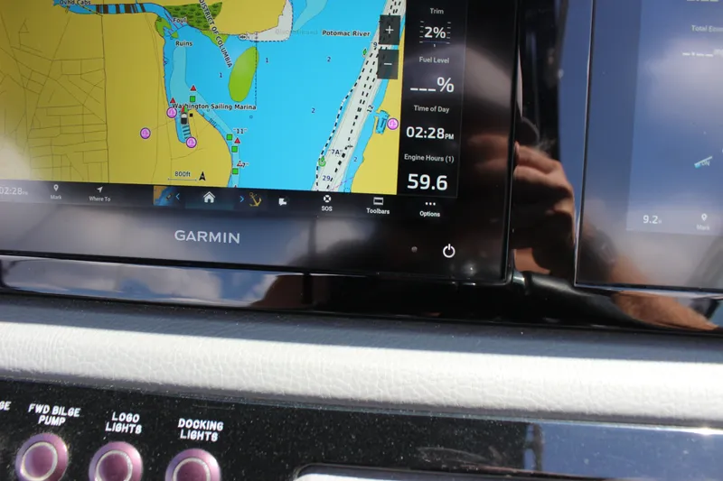 Slide: The Image of Garmin navigation display on 2024 Cobalt R6 Outboard boat dashboard. - 45