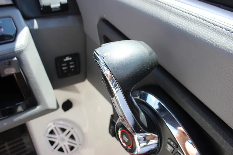 Slide: The Image of Throttle control of 2024 Cobalt R6 Outboard boat, featuring sleek design and modern controls. - 27