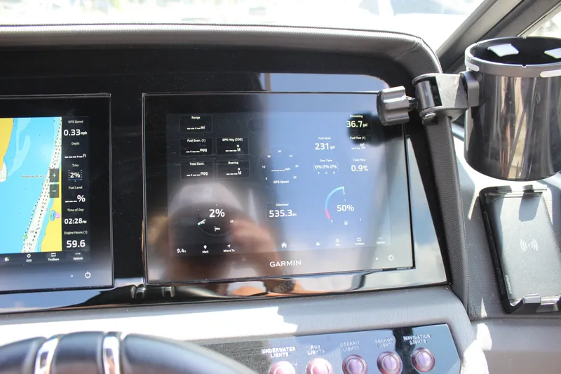 Slide: The Image of Dashboard of 2024 Cobalt R6 Outboard with Garmin navigation display and controls. - 47