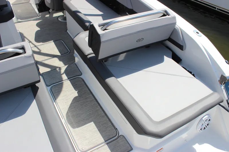 Slide: The Image of 2024 Cobalt R6 Outboard boat interior with gray seating and flooring. - 11