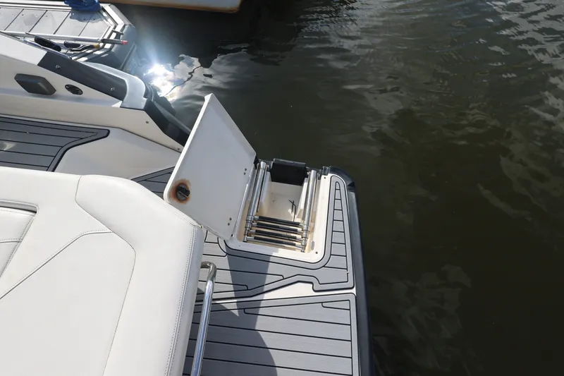 Slide: The Image of The swim platform of a 2014 Monterey 268SS Super Sport with a retractable ladder. - 10