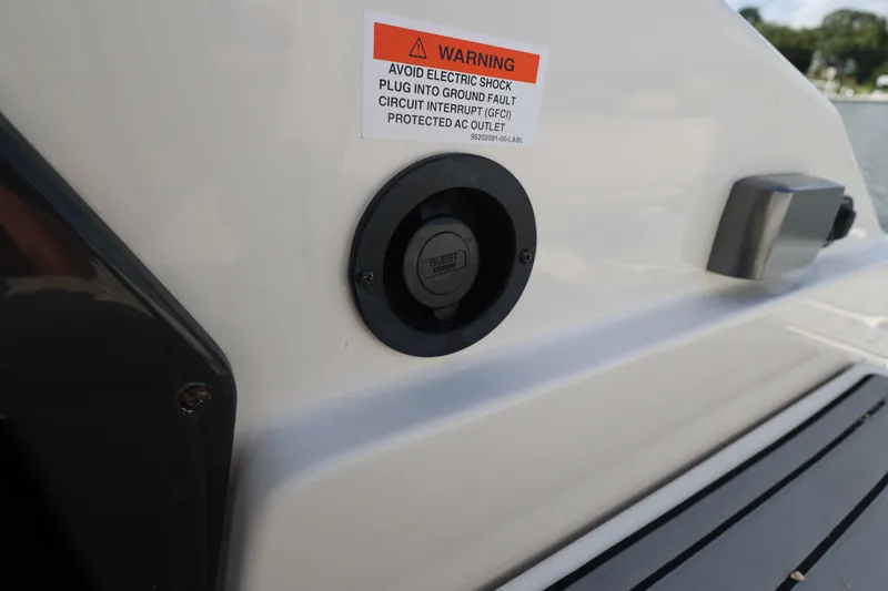 Slide: The Image of Close-up of a 2014 Monterey 268SS Super Sport boat's warning label and outlet. - 13