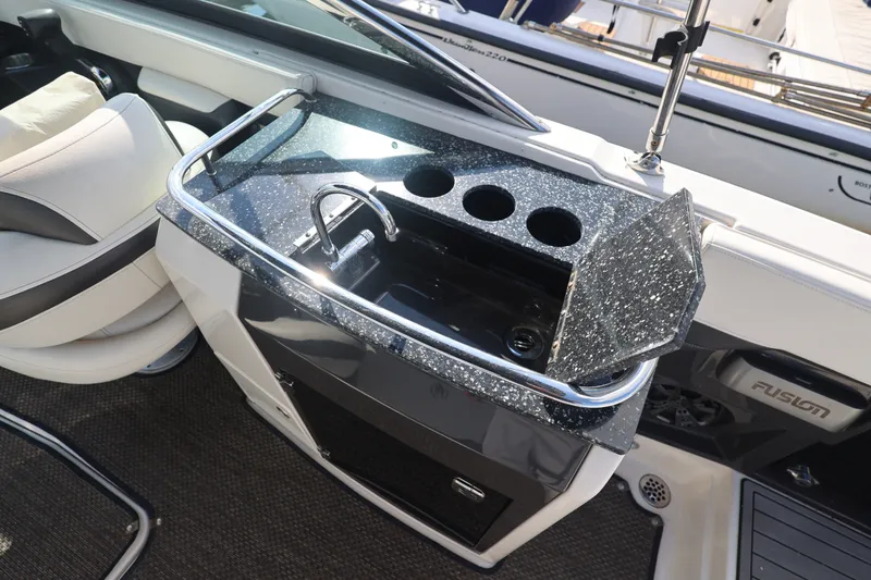 Slide: The Image of 2014 Monterey 268SS Super Sport boat interior with sleek sink and seating area. - 17