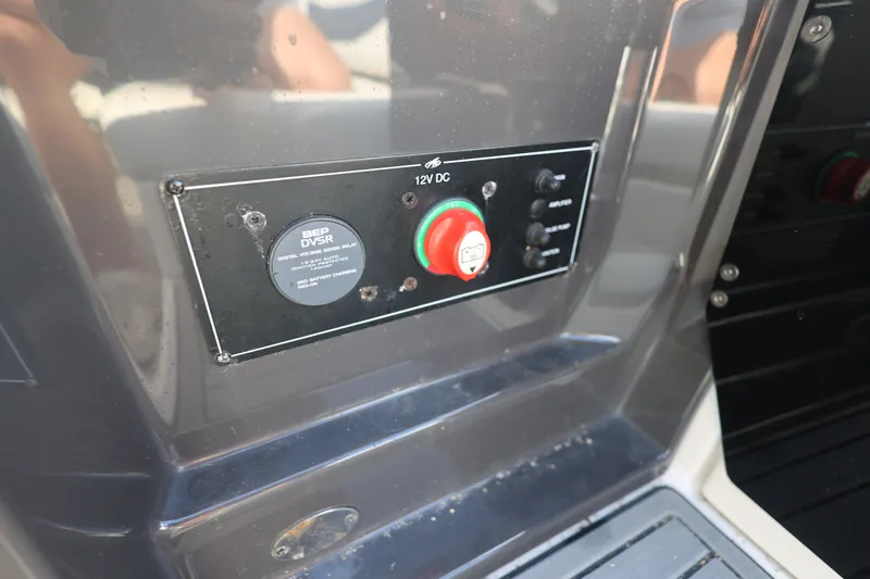Slide: The Image of Control panel of a 2014 Monterey 268SS Super Sport boat with 12V DC system. - 14