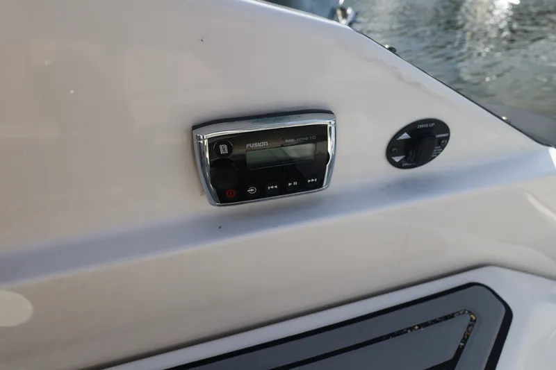 Slide: The Image of Control panel on a 2014 Monterey 268SS Super Sport boat, featuring a Fusion stereo system. - 12
