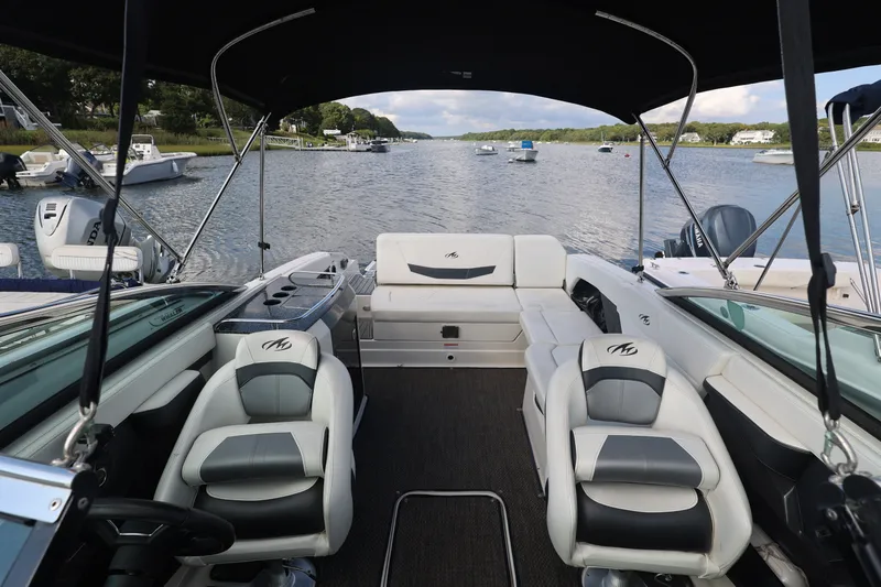 Slide: The Image of Interior view of a 2014 Monterey 268SS Super Sport boat on a scenic waterway. - 7