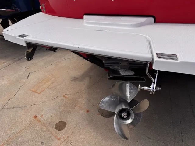 Slide: The Image of The image shows the stern of a 2019 Cobalt CS23 boat with a propeller. - 6