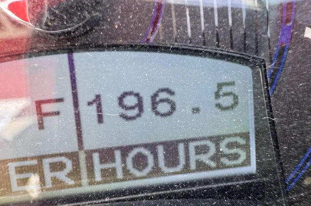 Slide: The Image of Close-up of a boat gauge showing 196.5 engine hours. - 14