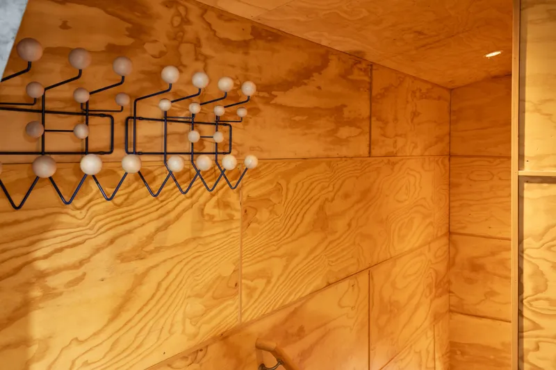 Slide: The Image of Wood-paneled interior with modern coat rack in 1969 Custom All Steel Boathouse. - 53