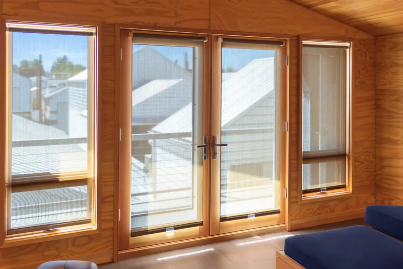 Slide: The Image of Interior view of a 1969 Custom All Steel Boathouse with wooden doors and windows. - 63