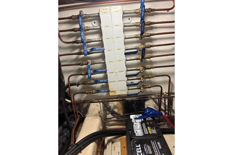 Slide: The Image of Fuel line system with labeled valves on a 1988 Hans Christian Independence 45 yacht. - 22