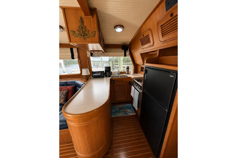 Slide: The Image of Interior of 1988 Hans Christian Independence 45 yacht with wooden cabinetry and modern appliances. - 7