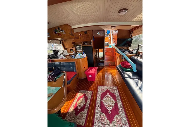 Slide: The Image of Interior of 1988 Hans Christian Independence 45 yacht with wooden flooring and cozy furnishings. - 18