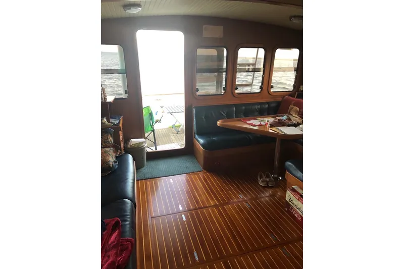 Slide: The Image of Interior of 1988 Hans Christian Independence 45 yacht with wooden flooring and seating area. - 14