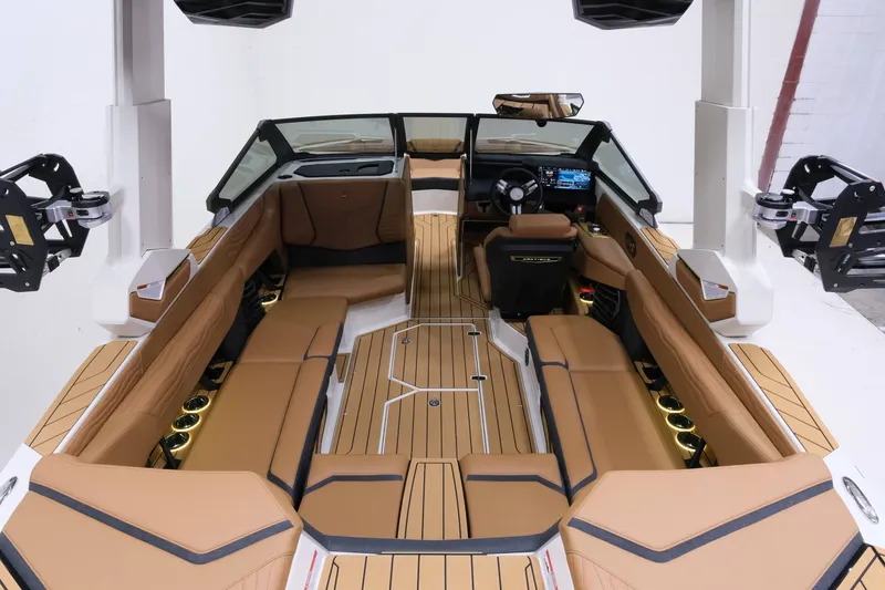Slide: The Image of The image shows the interior of a 2027 Nautique G23 with luxurious seating and modern design. - 9