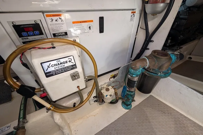 Slide: The Image of Engine room of 2008 Mainship 34 Trawler with oil change system and piping. - 50