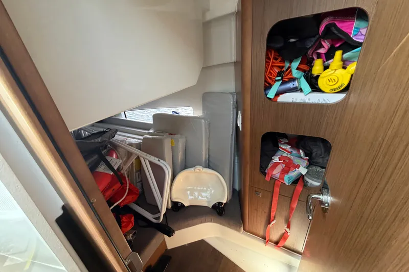 Slide: The Image of Interior storage of 2021 Beneteau Antares 27 boat with equipment and supplies. - 34