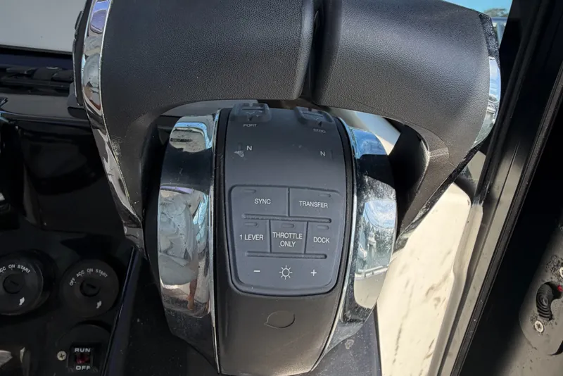 Slide: The Image of Throttle control panel of a 2021 Beneteau Antares 27 boat. - 22