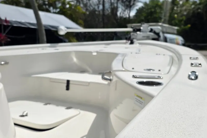 Slide: The Image of 2021 Sea Pro 228 Bay boat interior with sleek white design and modern features. - 23