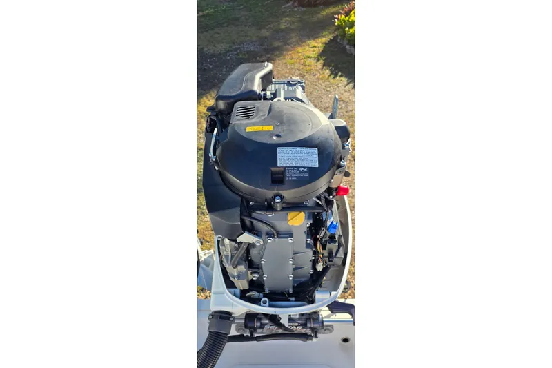 Slide: The Image of Outboard motor of a 2021 Sea Pro 228 Bay boat, detailed view. - 25