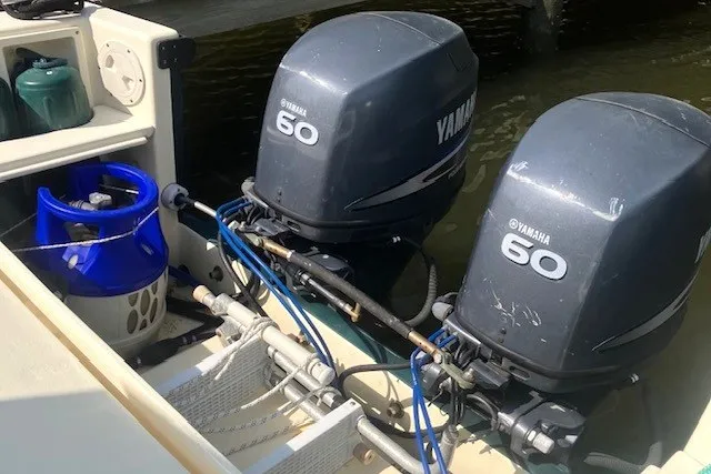 Slide: The Image of Twin Yamaha 60 engines on a 2007 Caledon 27 Trailerable Pocket Trawler. - 16