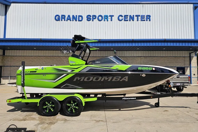 The Image of 2019 Moomba Craz Pro boat in vibrant green at Grand Sport Center. - 1