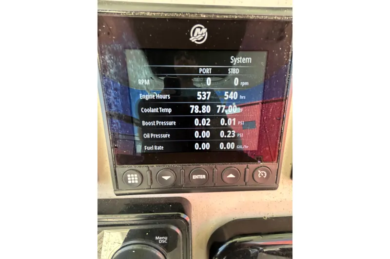 Slide: The Image of Dashboard display of a 2020 Boston Whaler 280 Outrage boat showing engine metrics. - 21