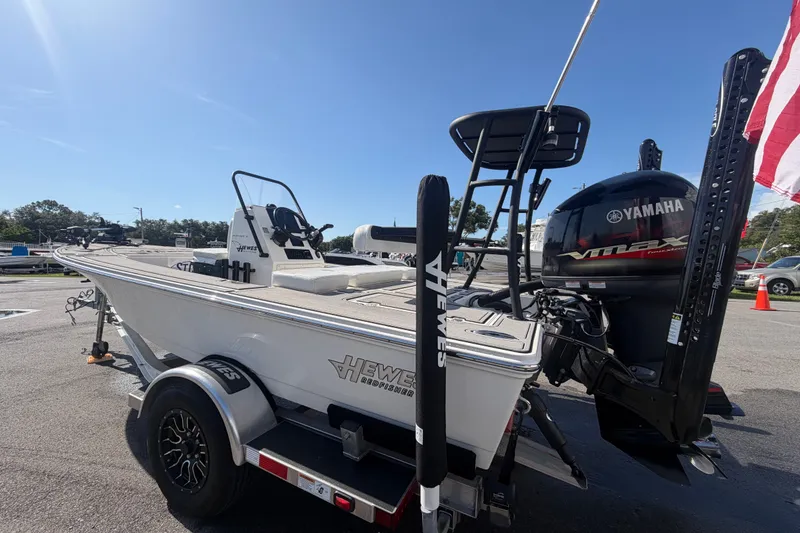 Slide: The Image of 2022 Hewes Redfisher 16 boat with Yamaha engine on trailer, outdoors. - 7