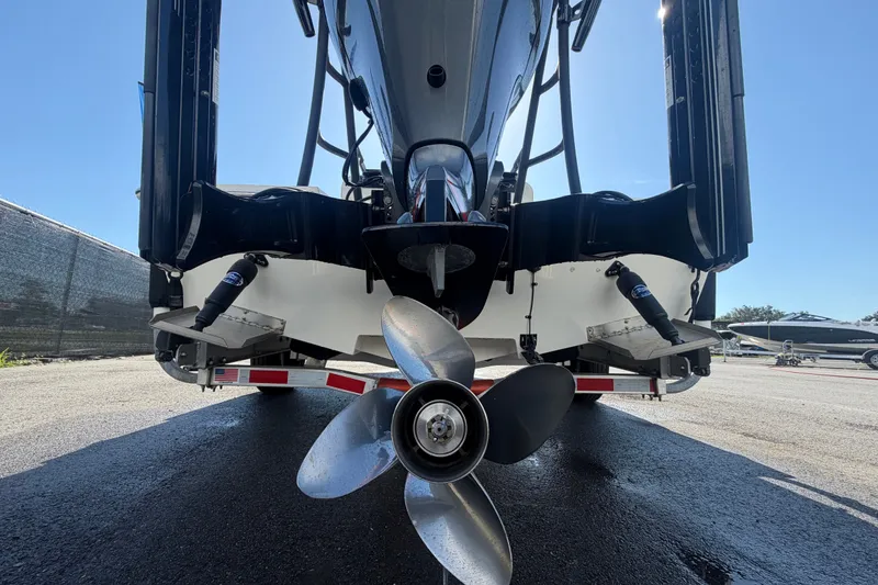 Slide: The Image of 2022 Hewes Redfisher 16 boat propeller and stern view on trailer. - 4