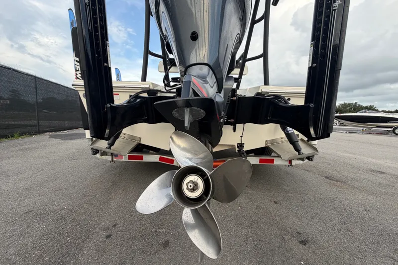 Slide: The Image of Rear view of a 2022 Hewes Redfisher 16 boat with propeller and trailer. - 3