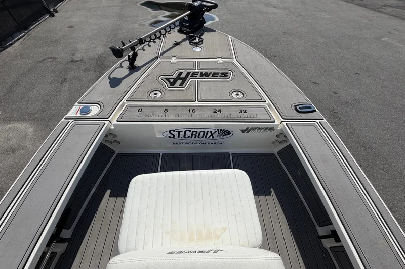 Slide: The Image of 2022 Hewes Redfisher 16 boat deck with St. Croix branding and measuring ruler. - 28