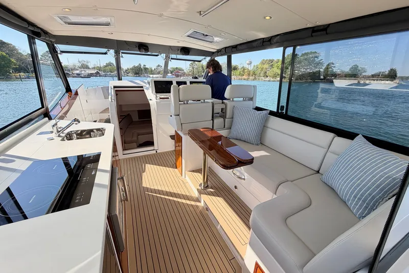 Slide: The Image of Luxurious interior of 2025 MJM 4 yacht with modern seating and kitchen area. - 20