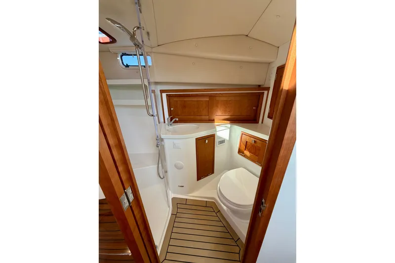 Slide: The Image of 2025 MJM 4 yacht bathroom with wooden cabinetry and modern fixtures. - 41