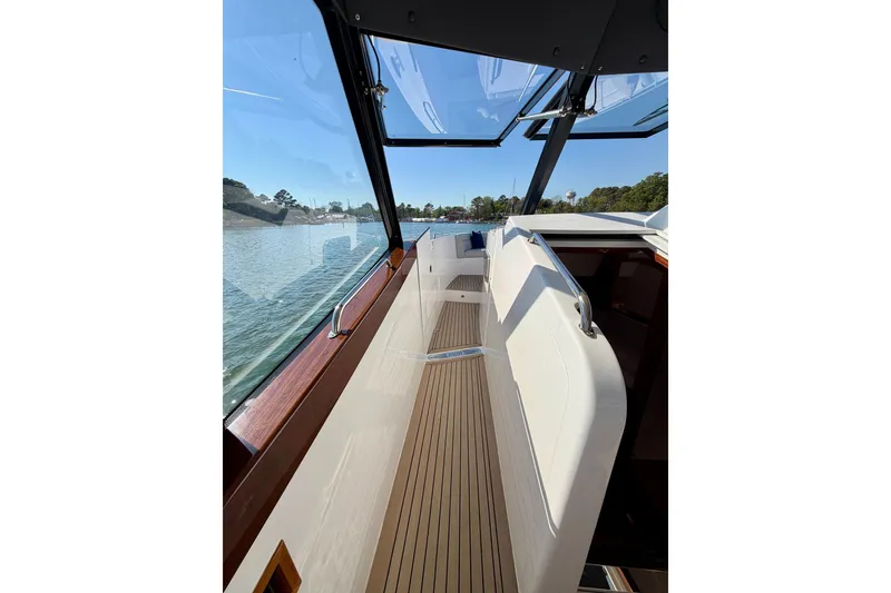 Slide: The Image of 2025 MJM 4 boat interior with sleek design and waterfront view. - 27